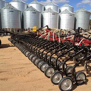 Agricultural Jockey Wheels near metal silos